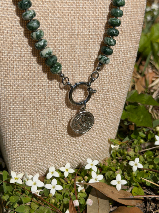 Green Rondelle with charm