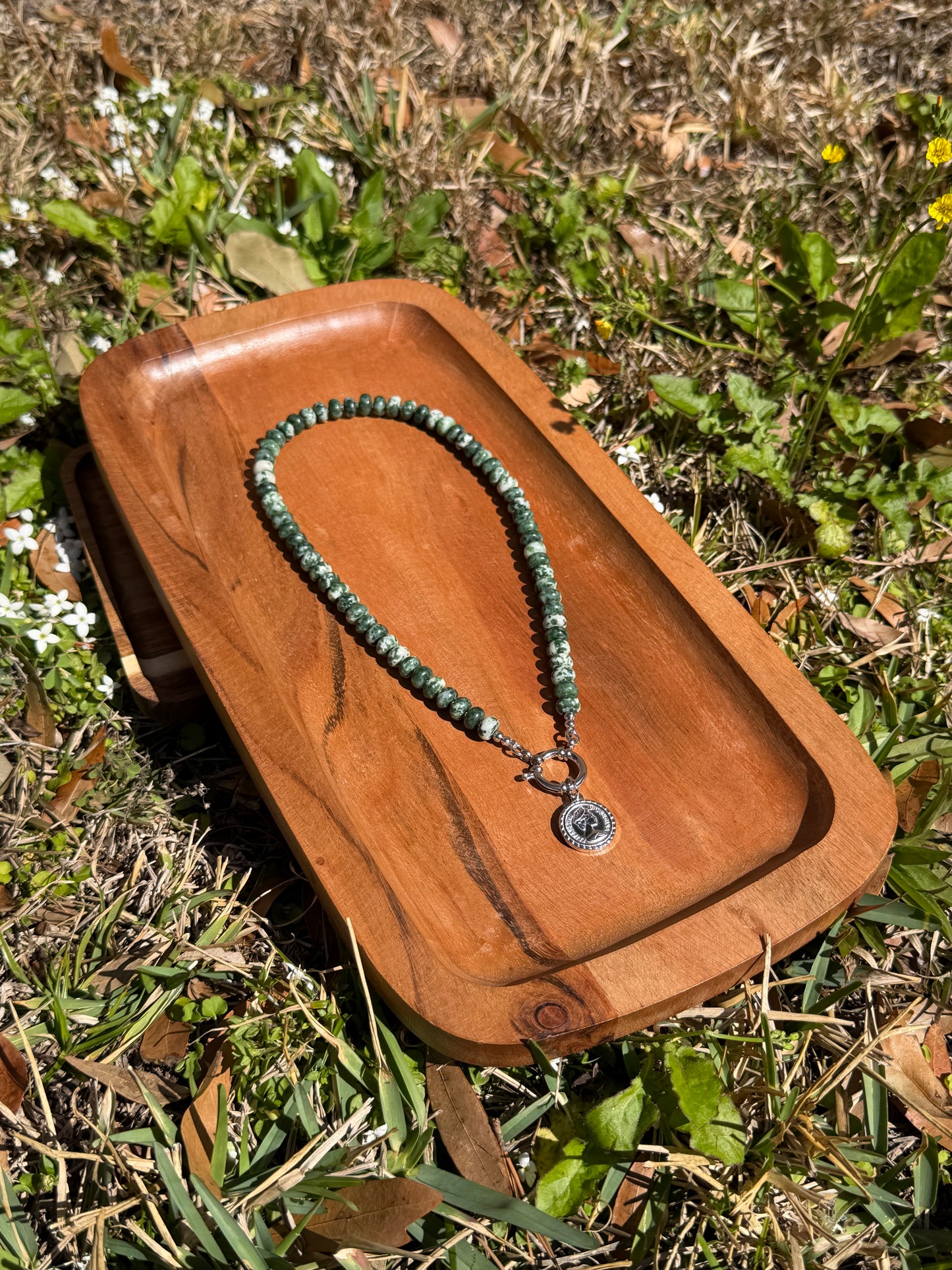 Green Rondelle with charm